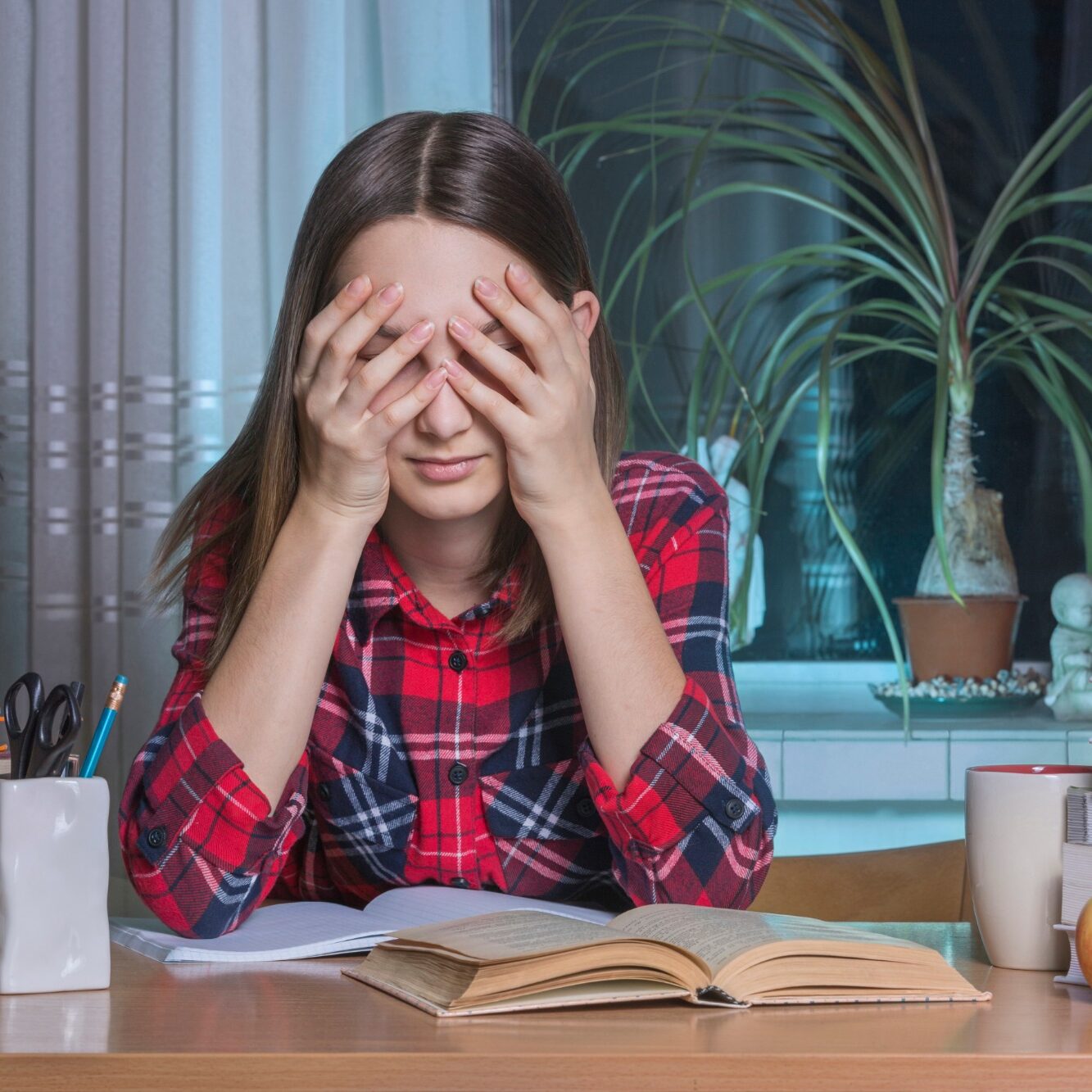 Teen tired while studying due to poor sleep